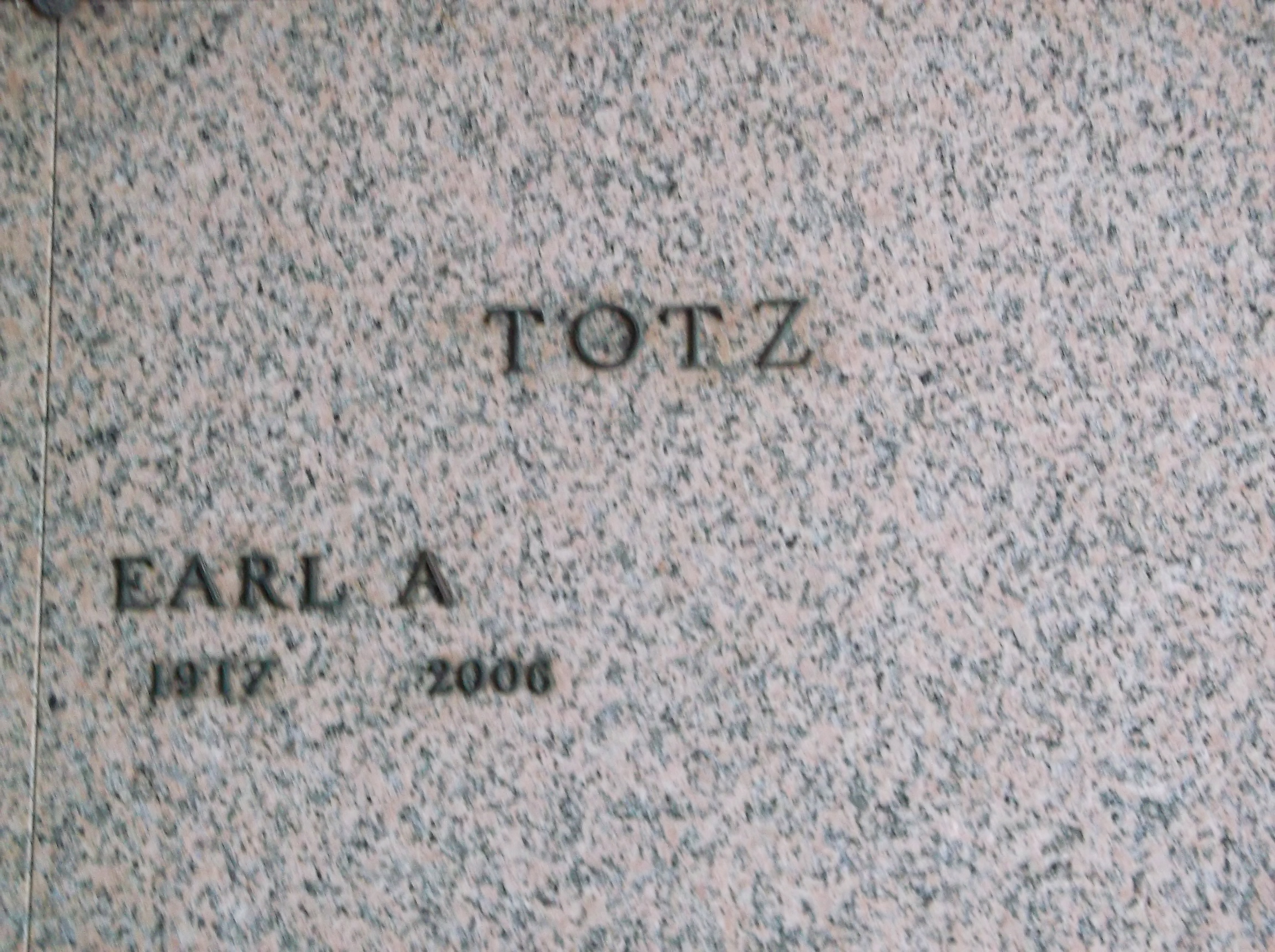 Earl A Totz