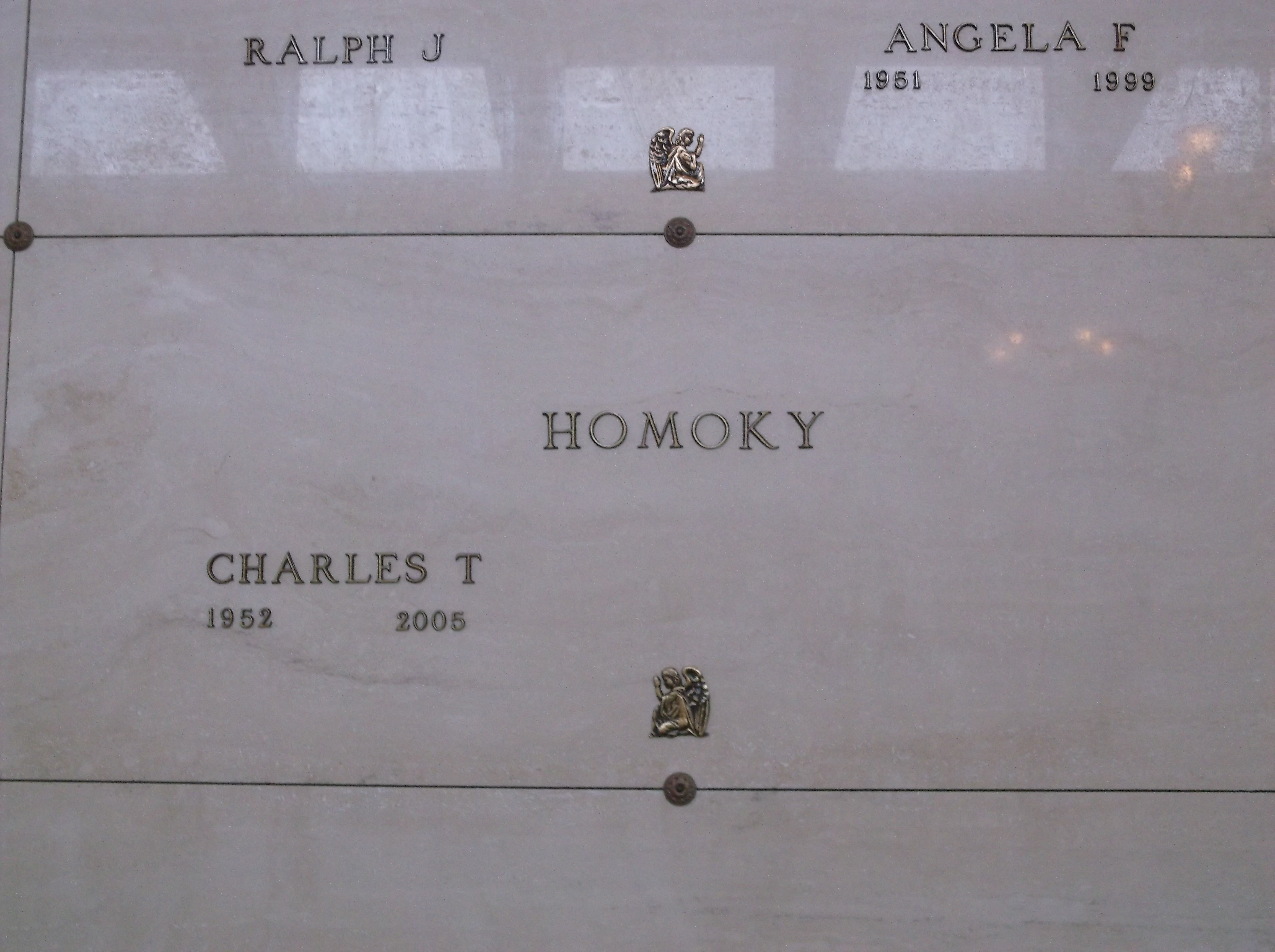 Charles T Homoky