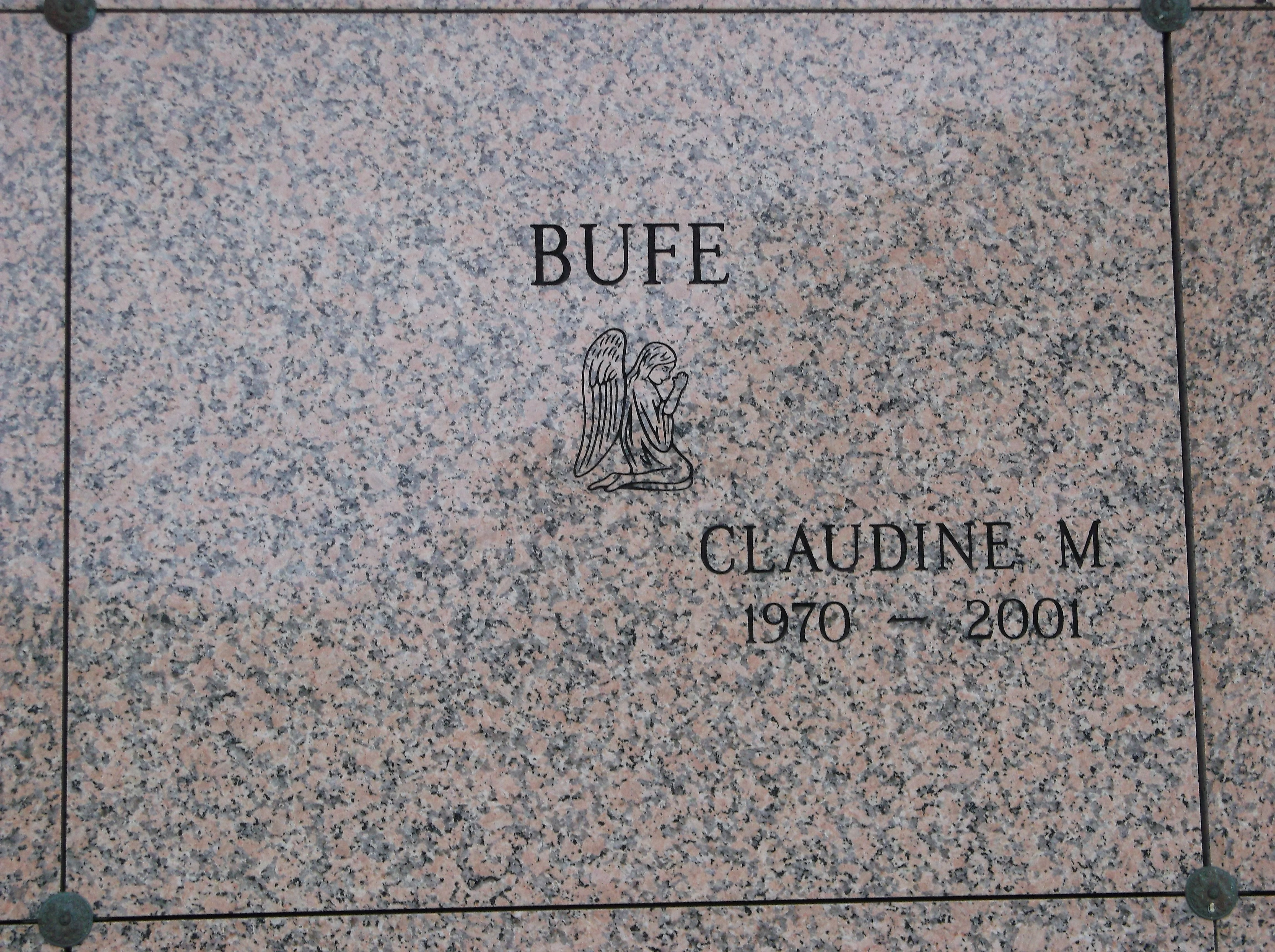 Claudine M Bufe