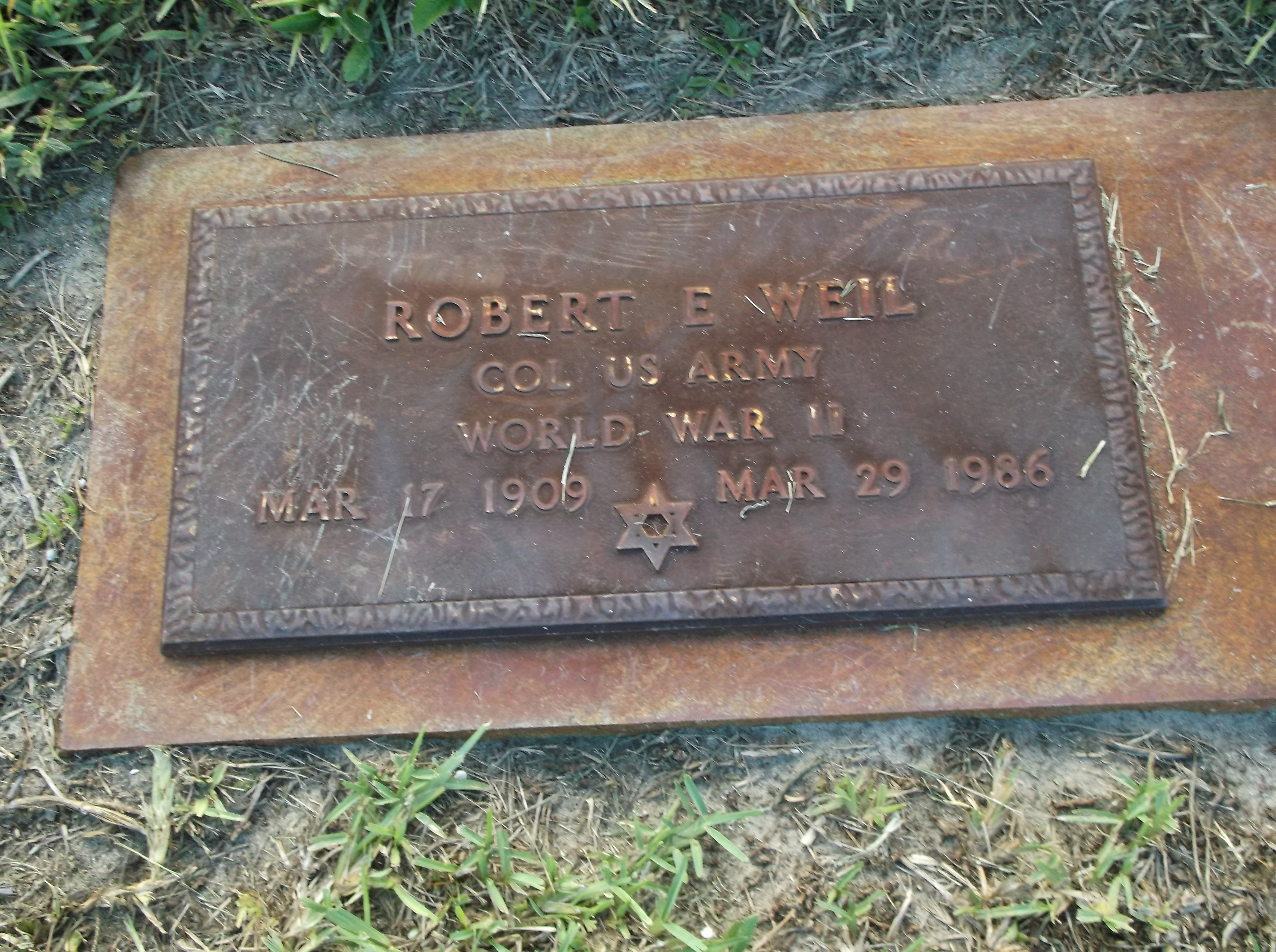 Robert E Weil