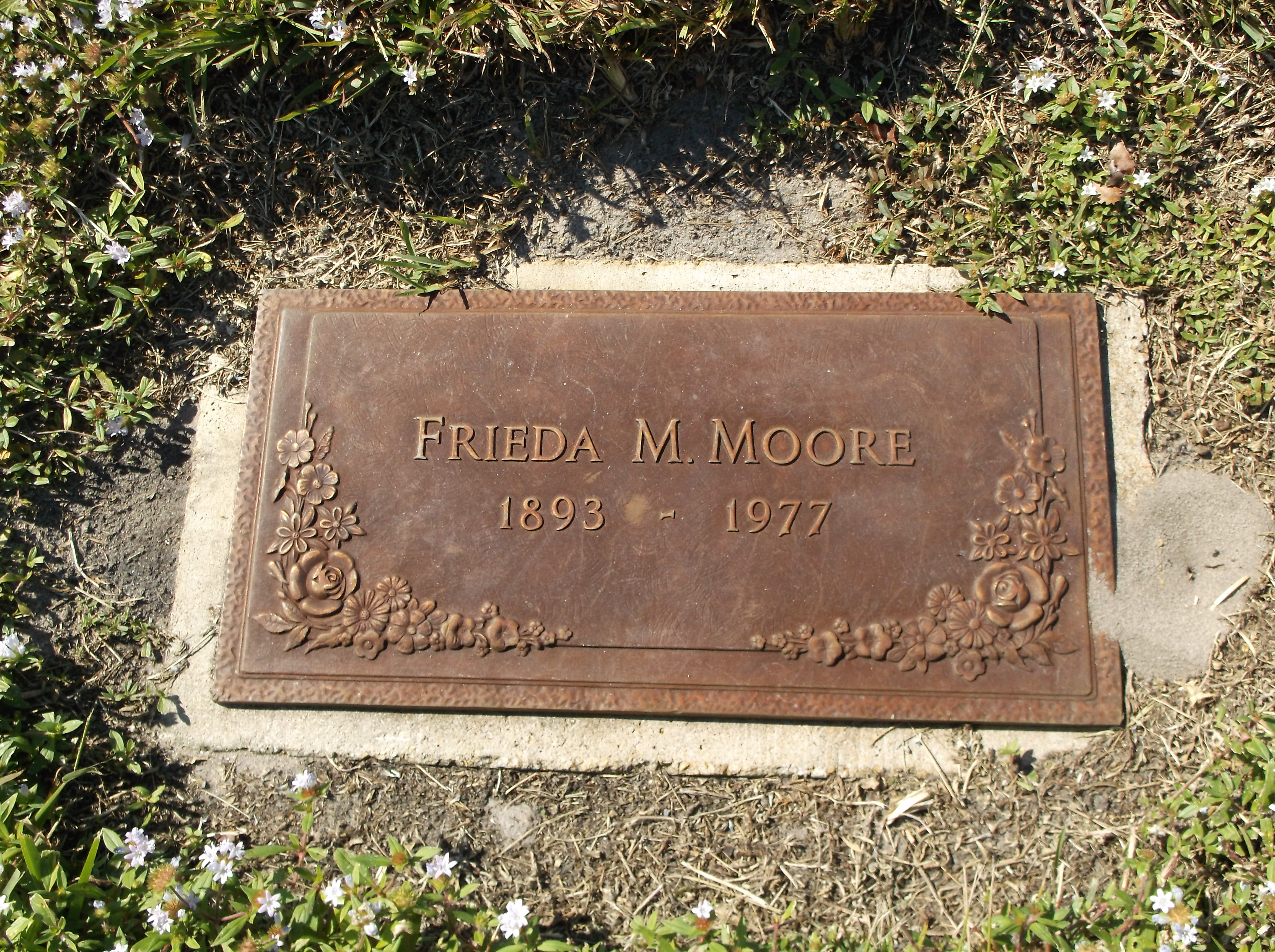 Frieda M Moore