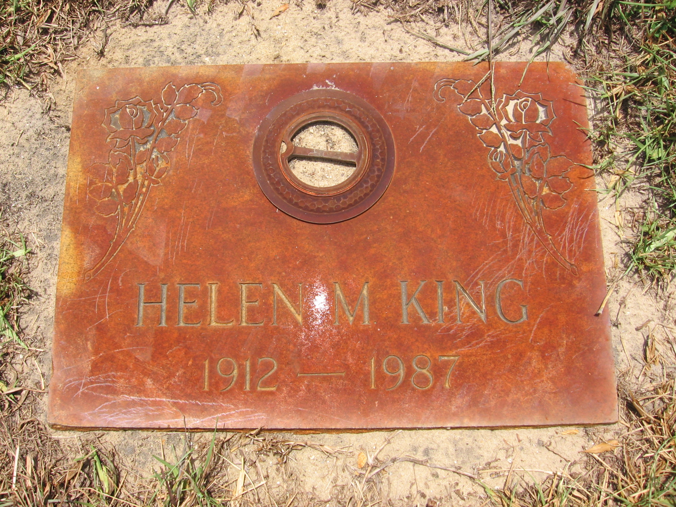 Helen M King