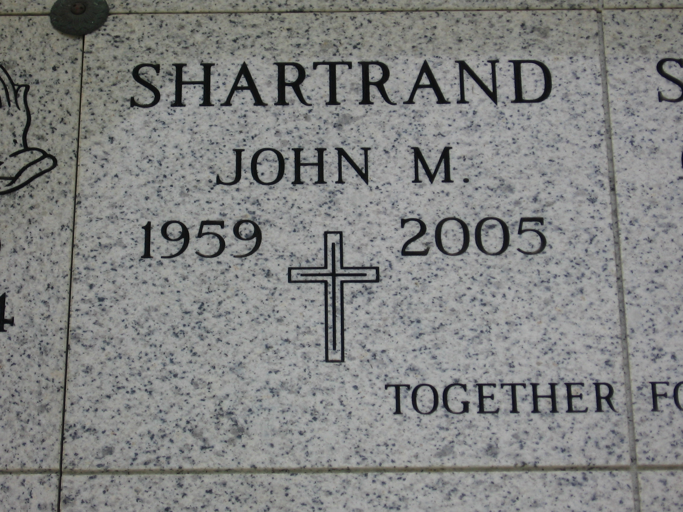 John M Shartrand
