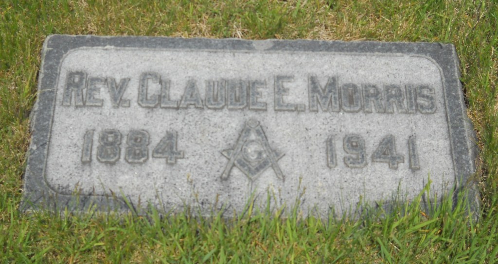Rev Claude E Morris