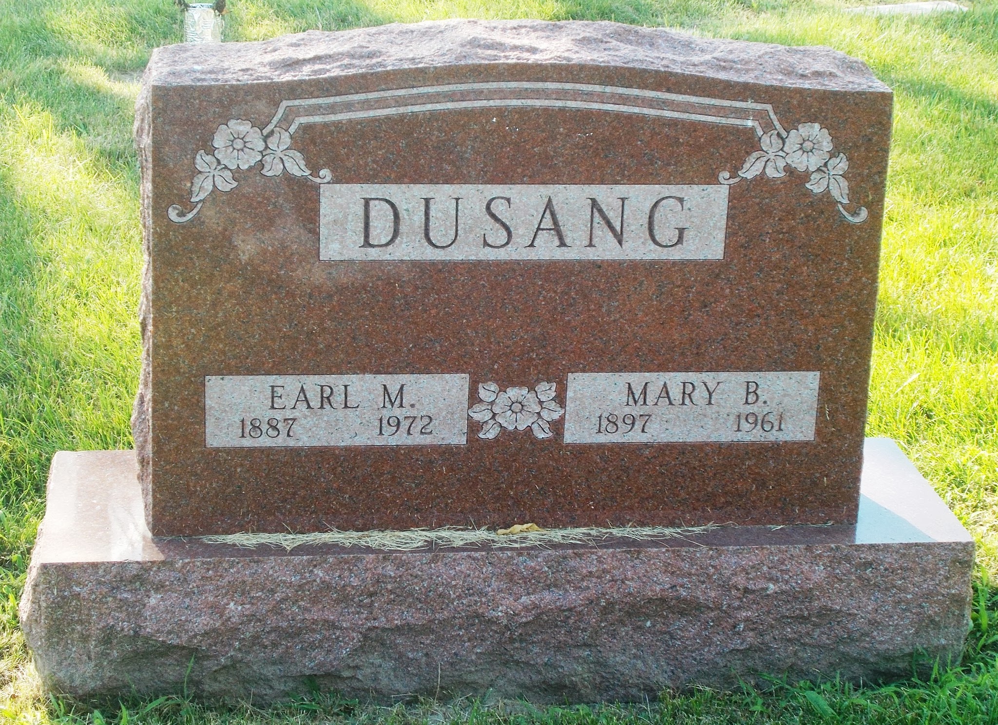 Earl M Dusang